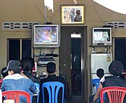 Adolescents watching trash TV by Asienreisender